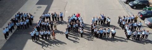 Students standing in formation to spell out "PEACE"